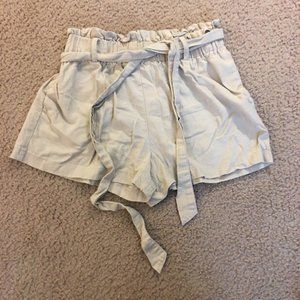 Have tie waist linen-blend tan shorts